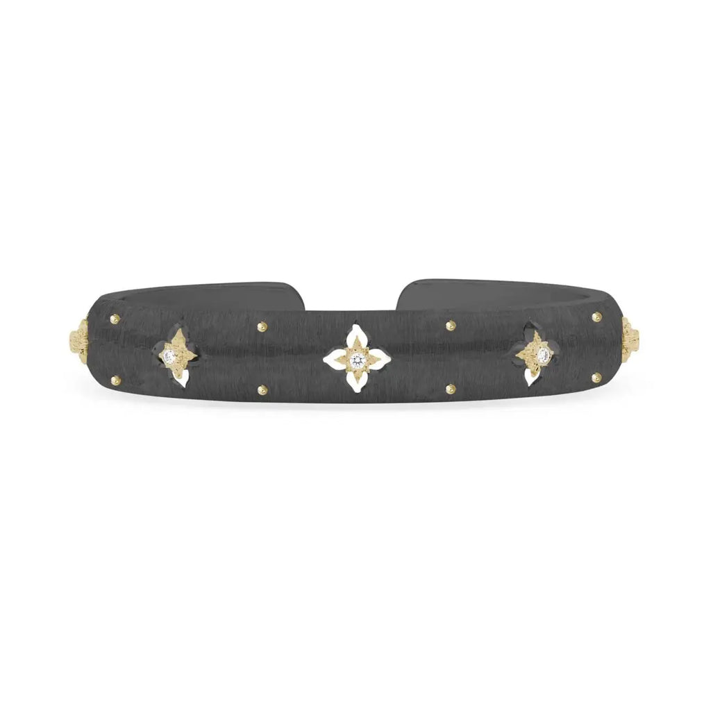 MACRI Giglio Bracelet in blackened 18k gold with brilliant-cut diamonds by Buccellati, featuring Rigato engraving and star-shaped rosettes.